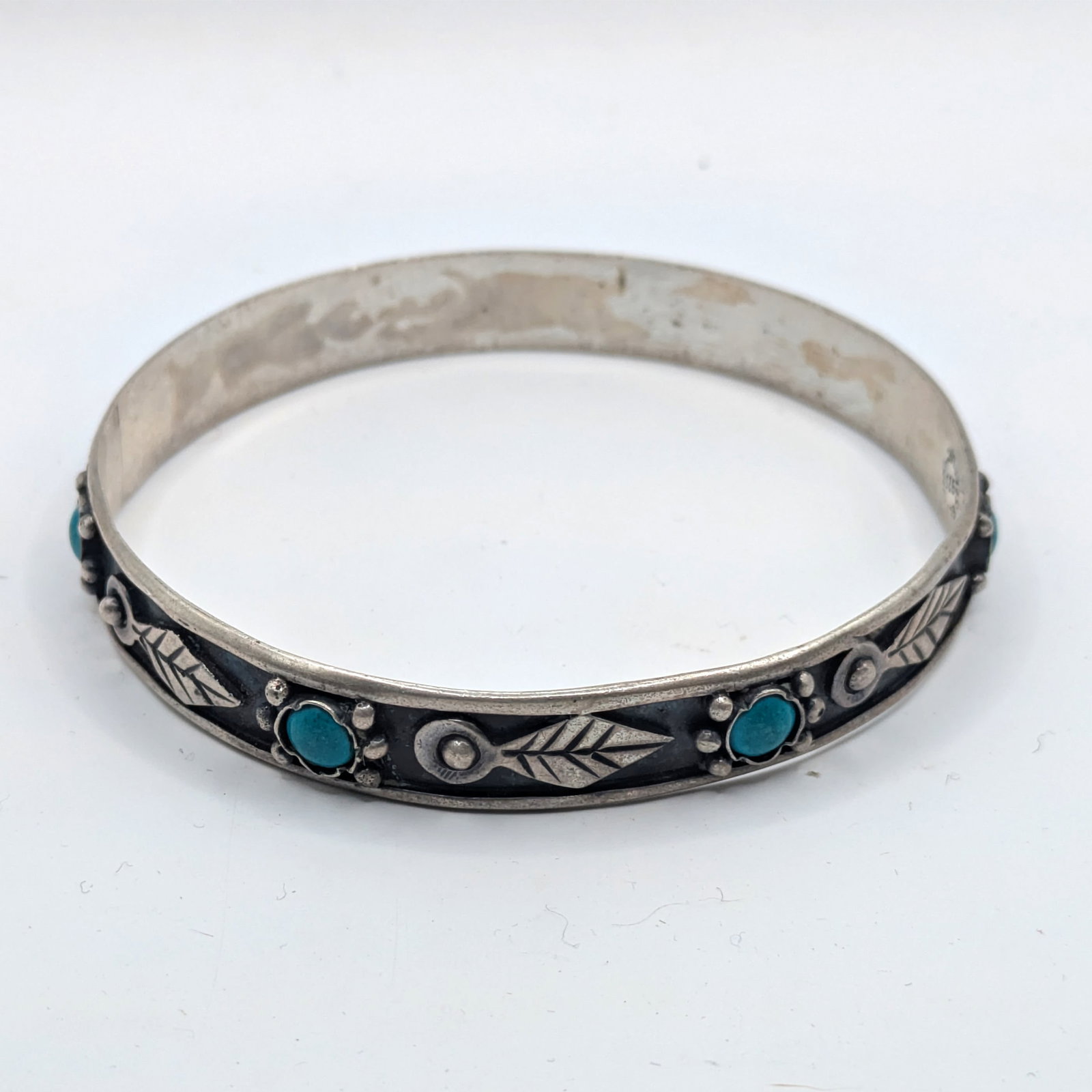 Native American Sterling and Turquoise Bracelet.: Diameter 2.5 inches.