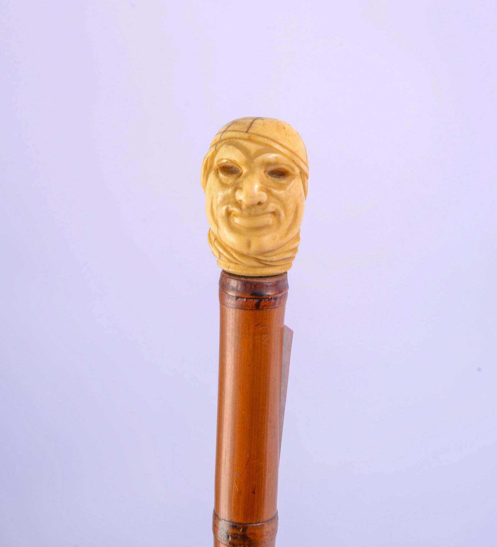 Sword Cane With Carved Head Handle.: Length 34 inches. Needs to be rewound.