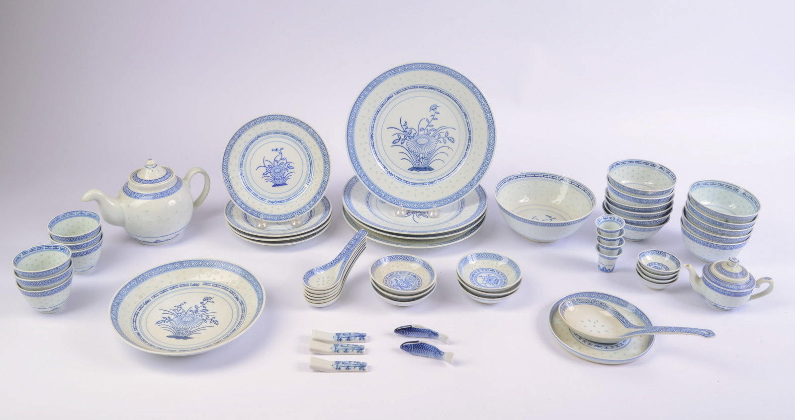 Group of Chinese Blue and White Porcelain Wares.: Teapot, height 6 inches, plates, bowls, and others.