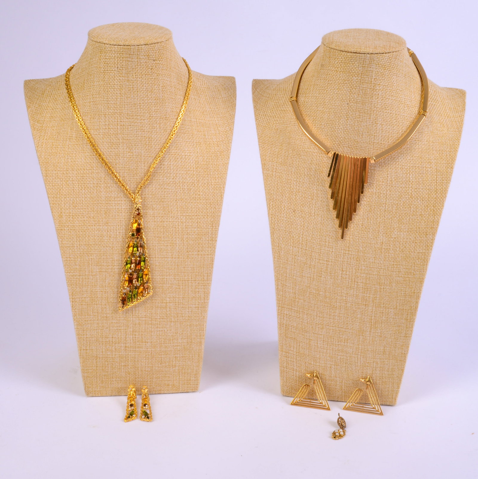 Two Gold Toned Necklaces and Two Pairs of Earrings.: Diameters of necklaces 5 and 6 inches.
