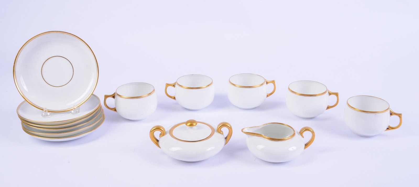 Bavarian Part Tea Service.: Sugar bowl, creamer, 5 teacups and 6 saucers. Good condition.