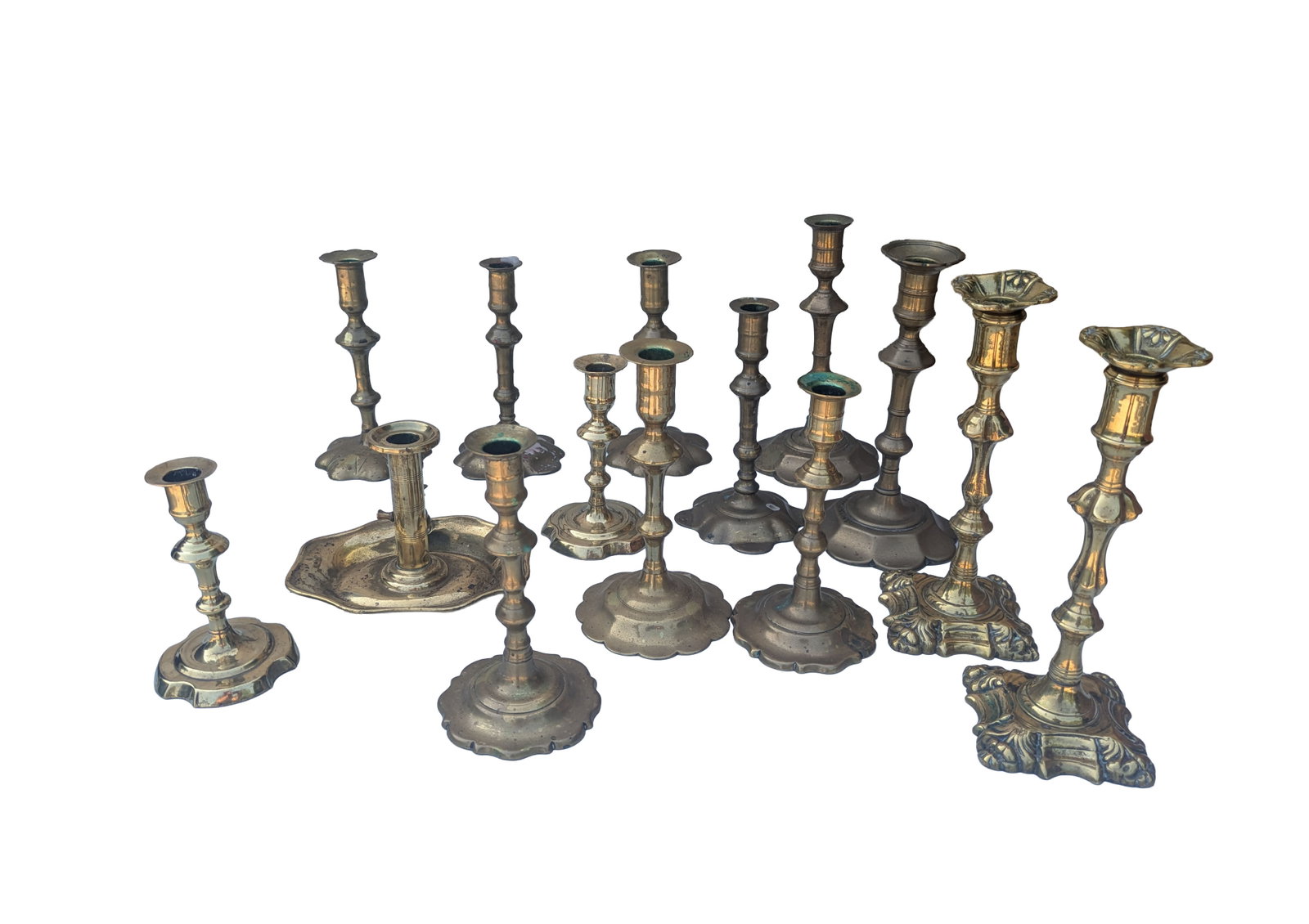 Fourteen Brass Candlesticks.: Heights 6 to 10 inches.