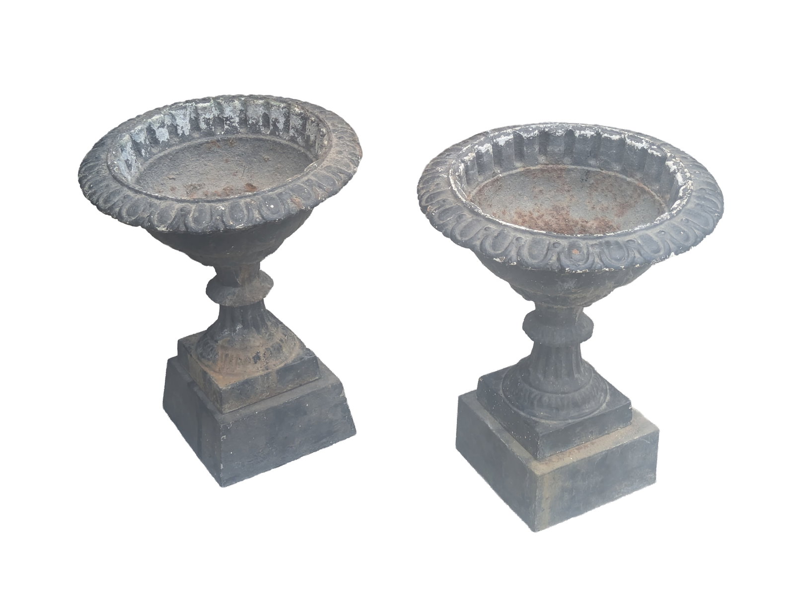 Pair of Cast Iron Urns.: Height 20 inches, diameter 16 inches.