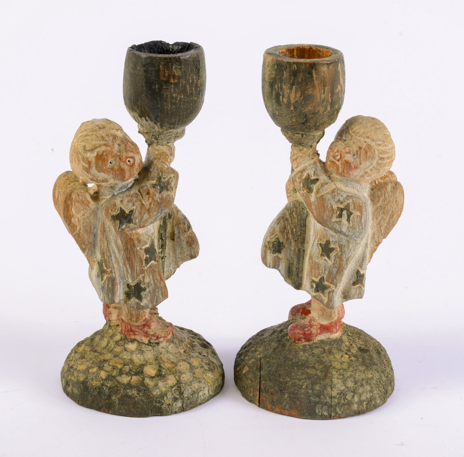 Pair of Carved and Painted Wooden Cherub Candlesticks.: Height 6 inches.