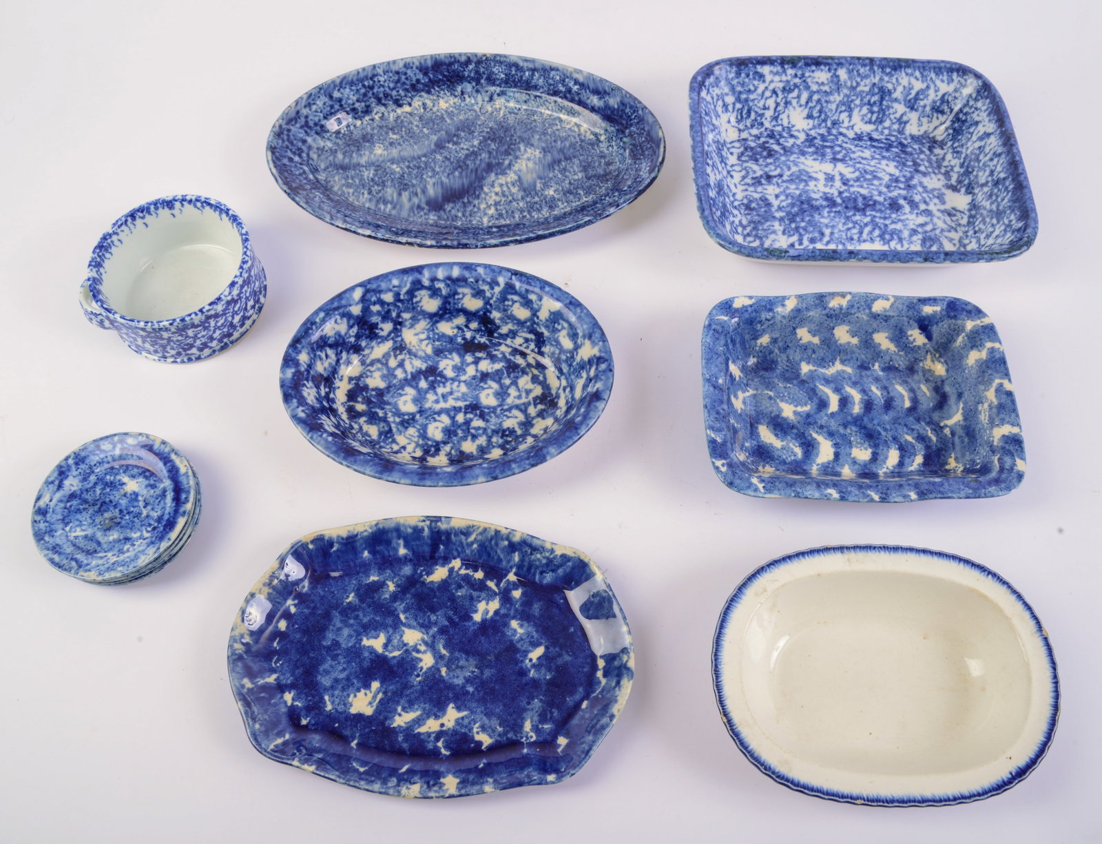 Collection of Blue and White Dishes.: 11 pieces, largest 12 x 8 inches. Some hairline cracks and chips.