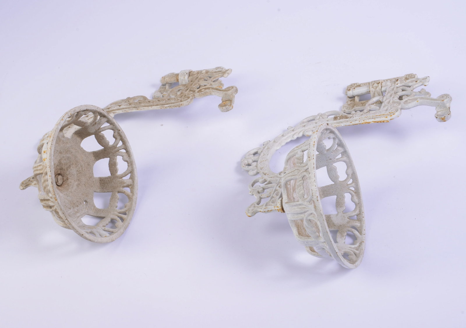Pair of Cast Iron Oil Lamp Holders.: Length 12 inches.