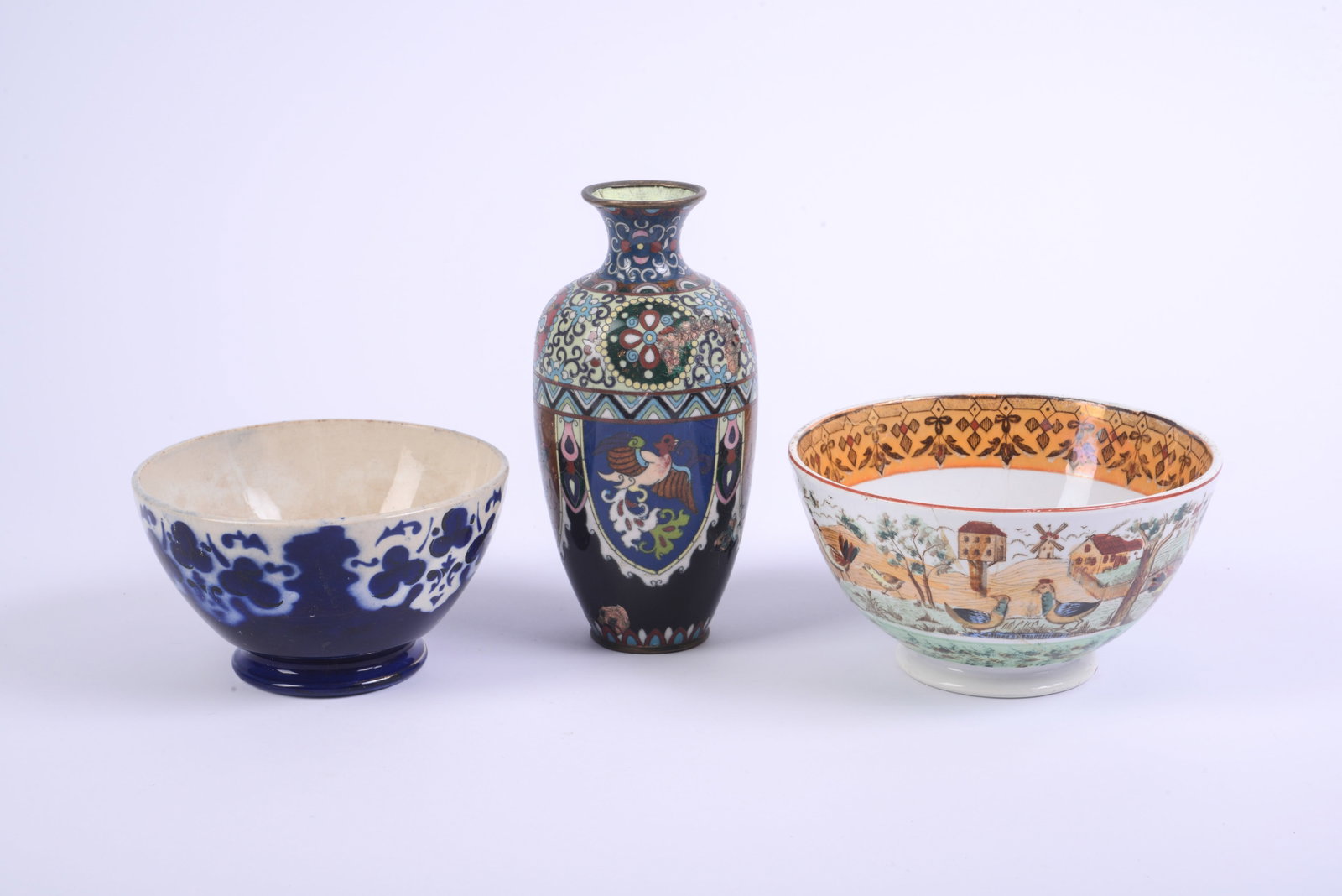 Three Decorative Table Objects.: Cloissonne vase, height 7.5 inches (damaged), and two bowls.