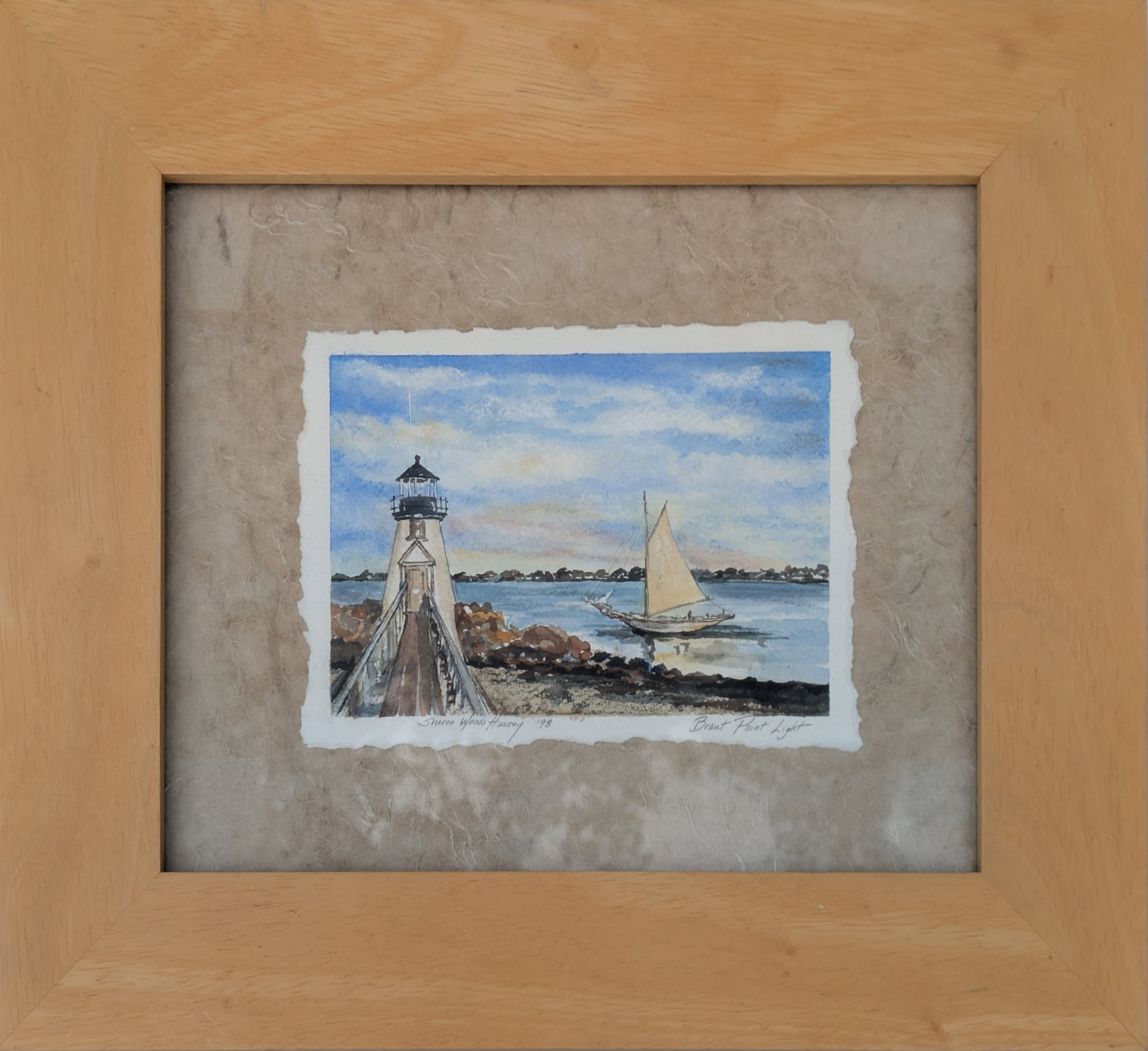 Sharon Woods Hussey. Brant Point Lighthouse at Nantucket Harbor.: Signed Lower Left Sharon Woods Hussey. Dated 1998. Watercolor on paper, 4 1/2 x 6 1/2 inches. Framed, 11 1/2 x 13 1/2 inches.