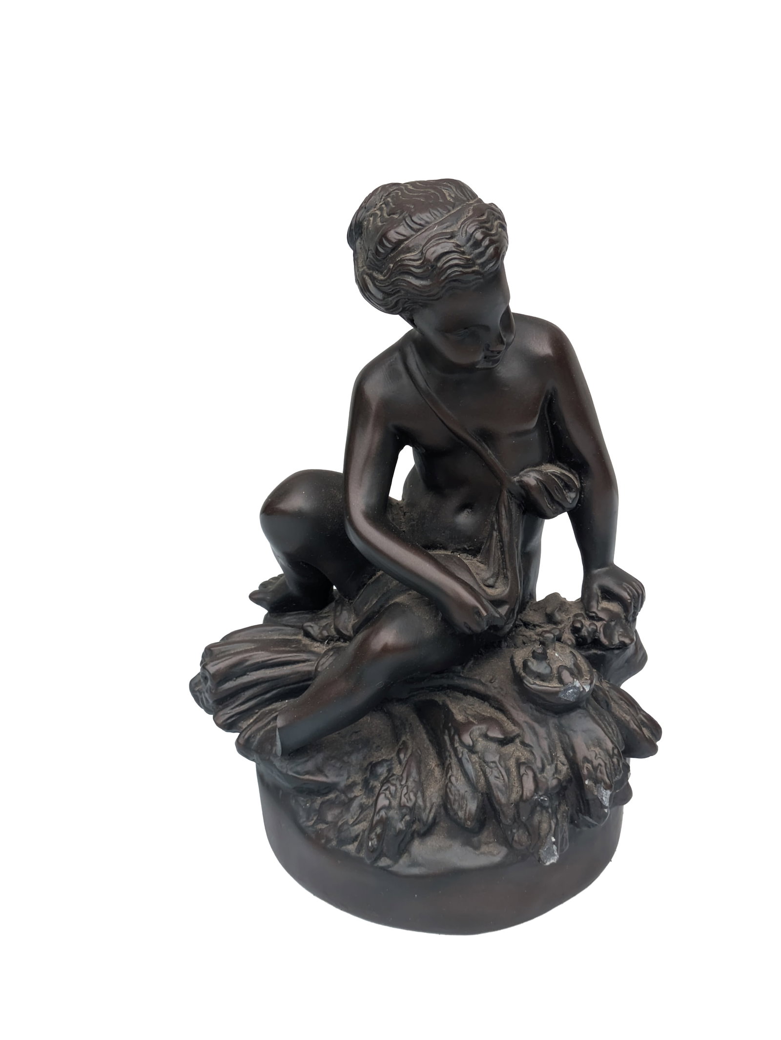 Sculpture of a Seated Boy.: Resin, H10 x 7 x 5 inches. One foot broken.