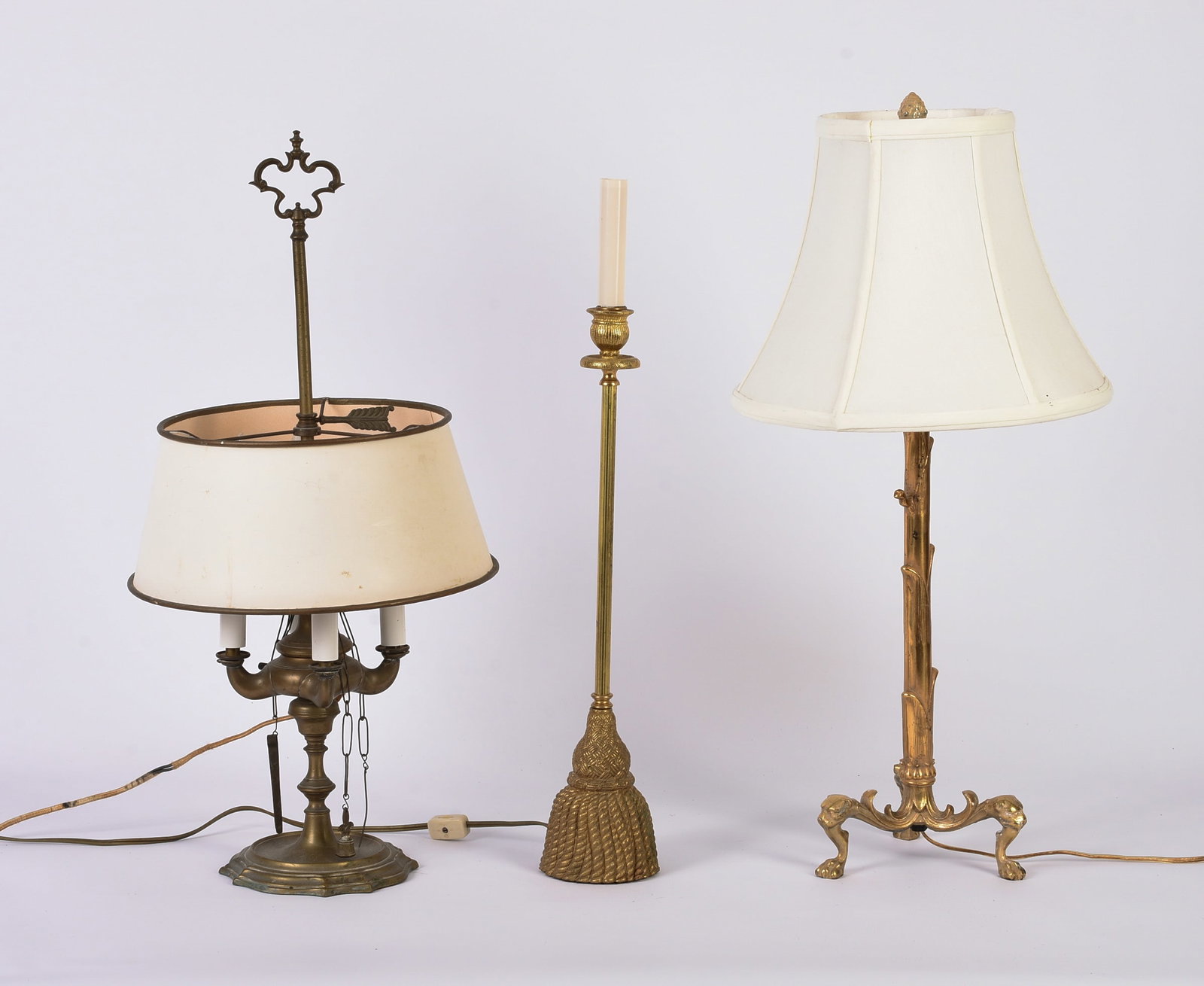 Three Brass Table Lamps.: Heights 18, 24 and 25 inches.