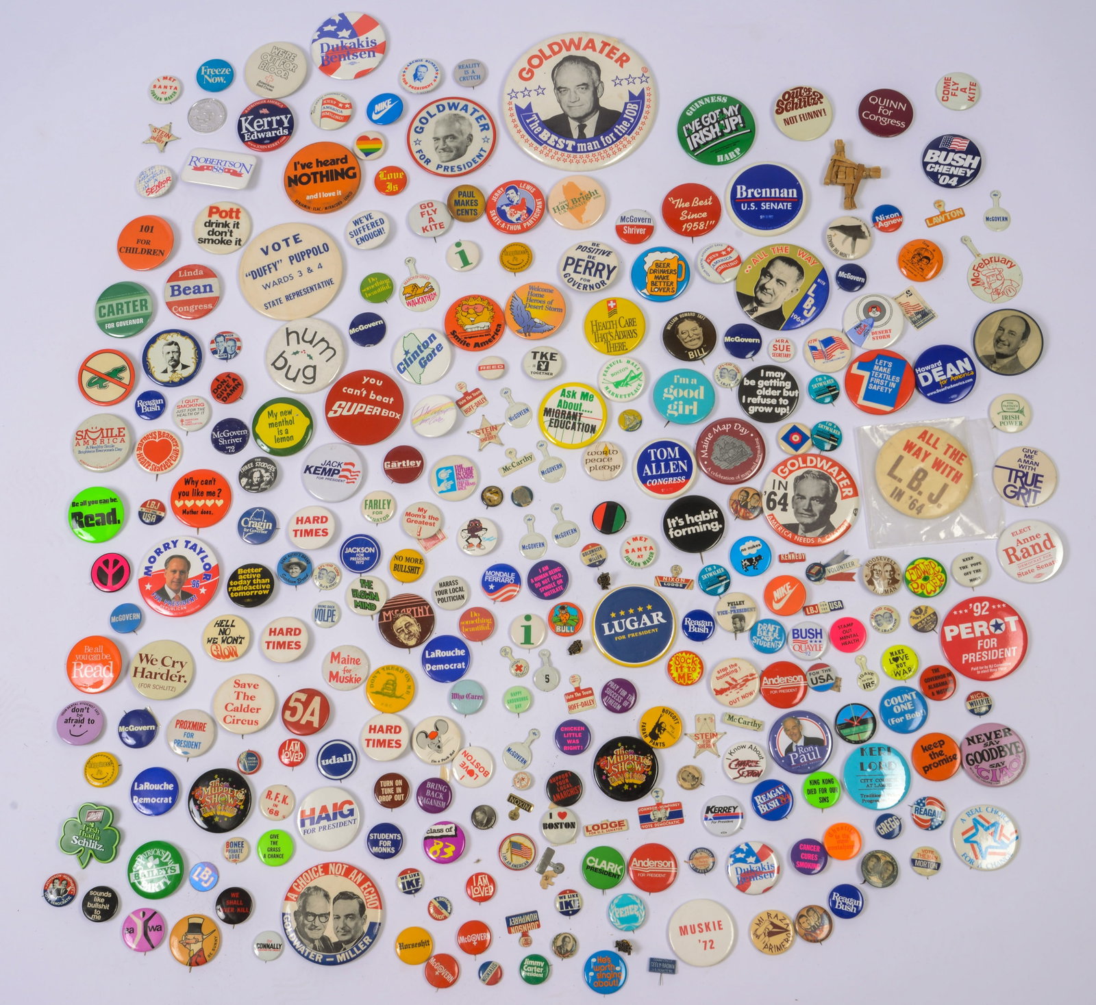 Large Collection of Political Pins.: Brennan, Goldwater, Perot, Howard Dean, Linda Bean, Adlai Stevens, and others.