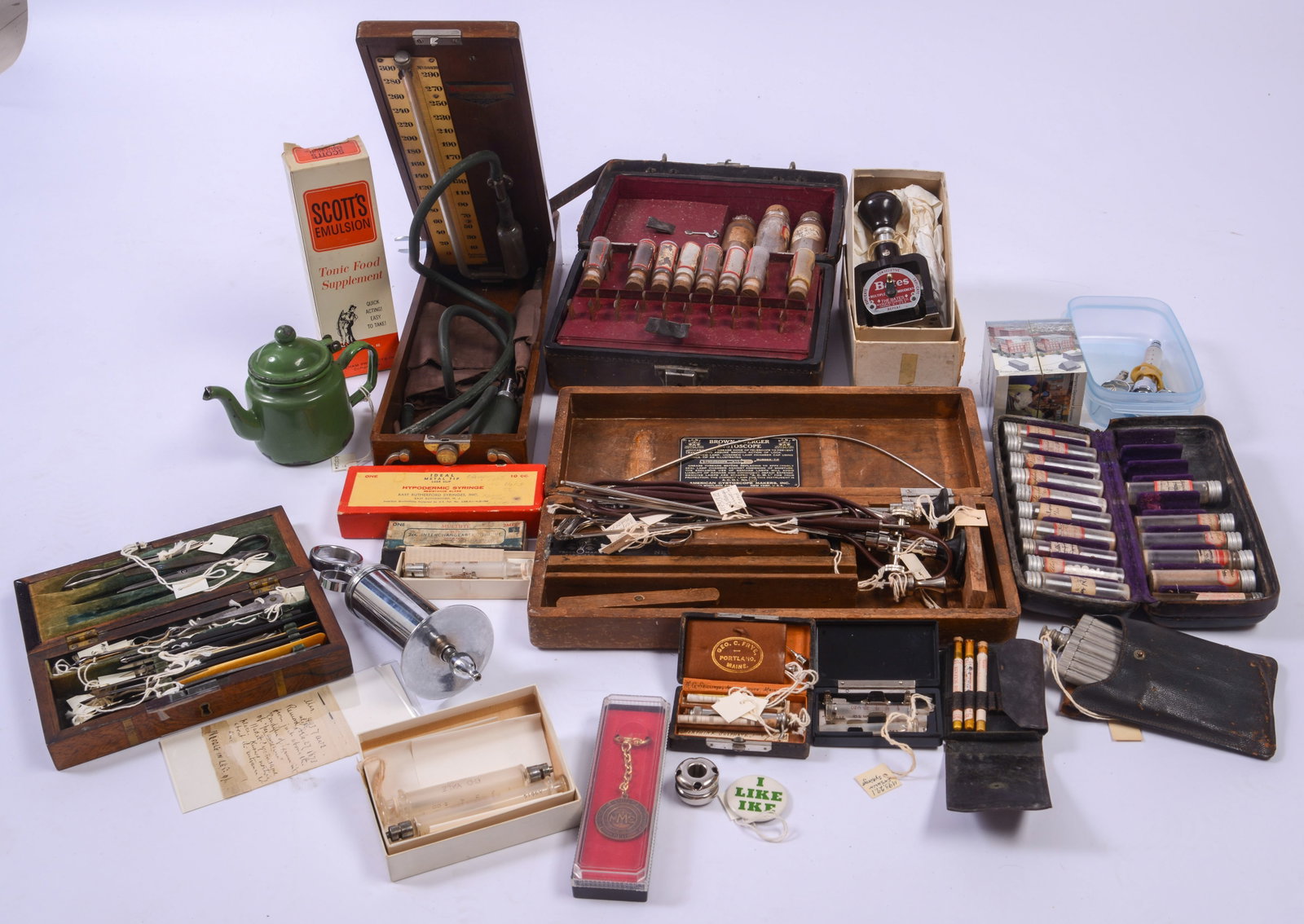 Collection of Old Medical Implements.: Blood pressure cuff, surgical tools, and others.