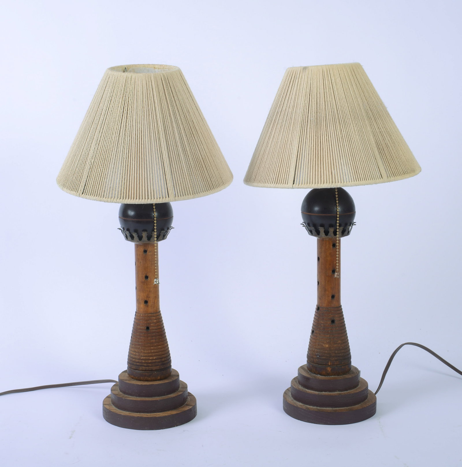 Pair of Lamps Made of Old Bobbins.: Height 20 inches.
