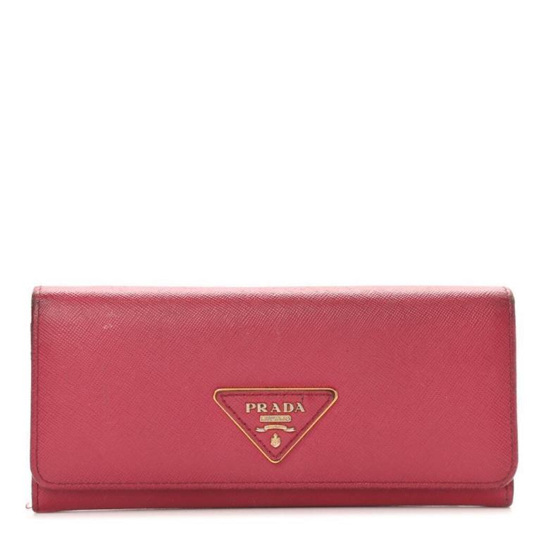 Prada Peonia Saffiano Triangle Continental Flap Wallet: If you're looking for a sophisticated and chic wallet that will make a statement, then look no further than the Prada Peonia Saffiano Triangle Continental Flap Wallet. This gorgeous wallet is crafted
