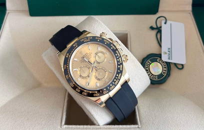 Brand New 18kt Gold Daytona on Oysterflex Strap Comes w