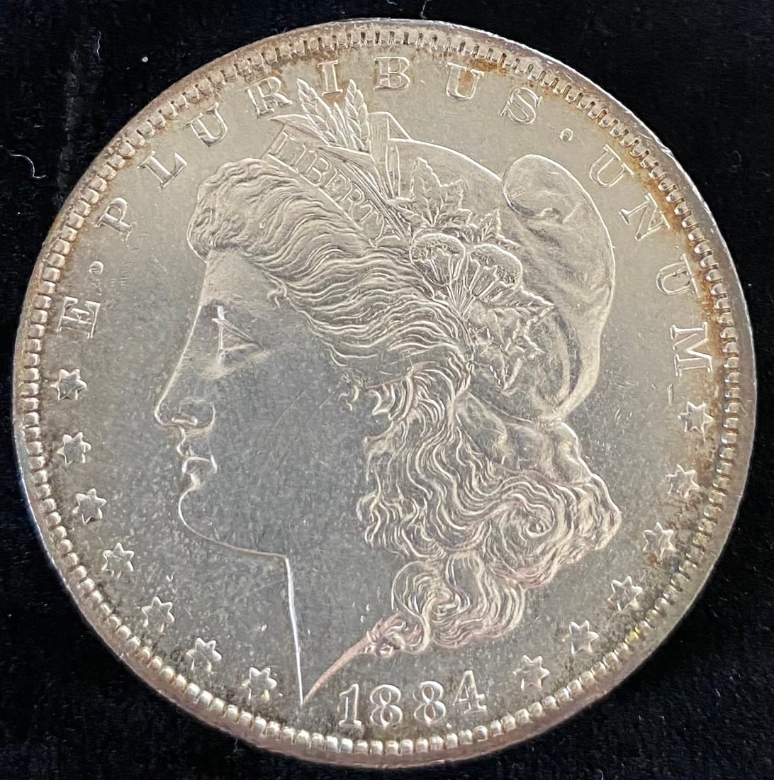 1884-CC Morgan Silver Dollar TONED BU (1 of 2)