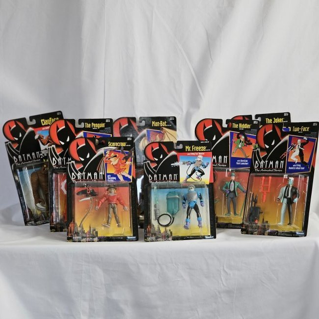 Group of Batman Villain Action Figures: Group of 8 Kenner Villains from The Animated Series, no duplicates. Includes Penguin with Hypo-spin umbrella launcher. All unopened original blister packs.