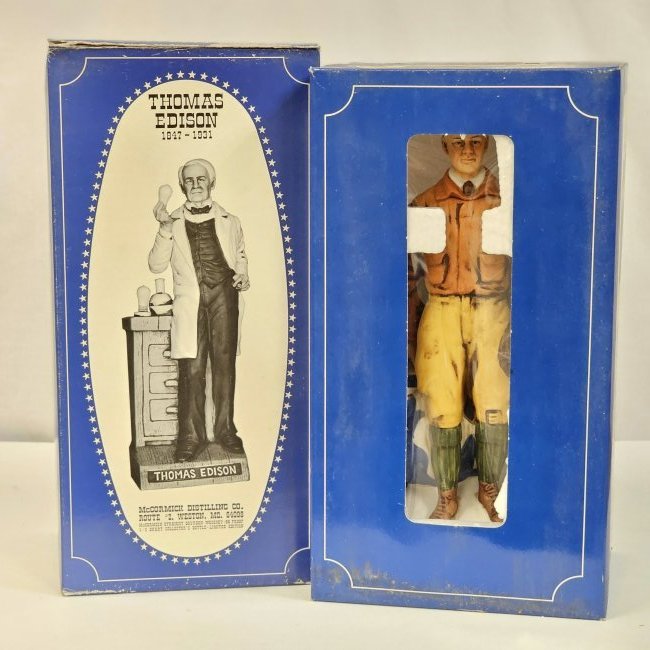Group McCormick The Great Americans Thomas Edison & Charles A. Lindbergh: 2 Bourbon Whiskey McCormick porcelain of Thomas Edison & Charles A. Lindbergh. Packaging on boxes is worn, but bottles are intact and in good condition.