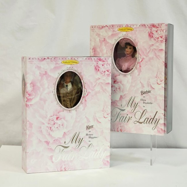 Pair of Dolls Hollywood Legends My Fair Lady Henry and Eliza: 2 Mattel Dolls from My Fair Lady, in boxes with flap closures, Eliza Doolittle in pink floral look, and dapper Henry Higgins in Tweed.