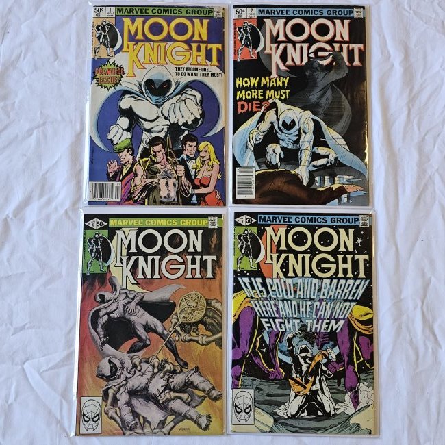 Lot of Marvel Comics Group Moon Knight Comic Books: Lot of 22 Marvel Comics Group Moon Knight comic books in sleeves and card backs.Featuring:Issue #'s 1 (has damage to upper right corner), 2, 6-15, 16(2), 17-24Please refer to photos for cover images. 