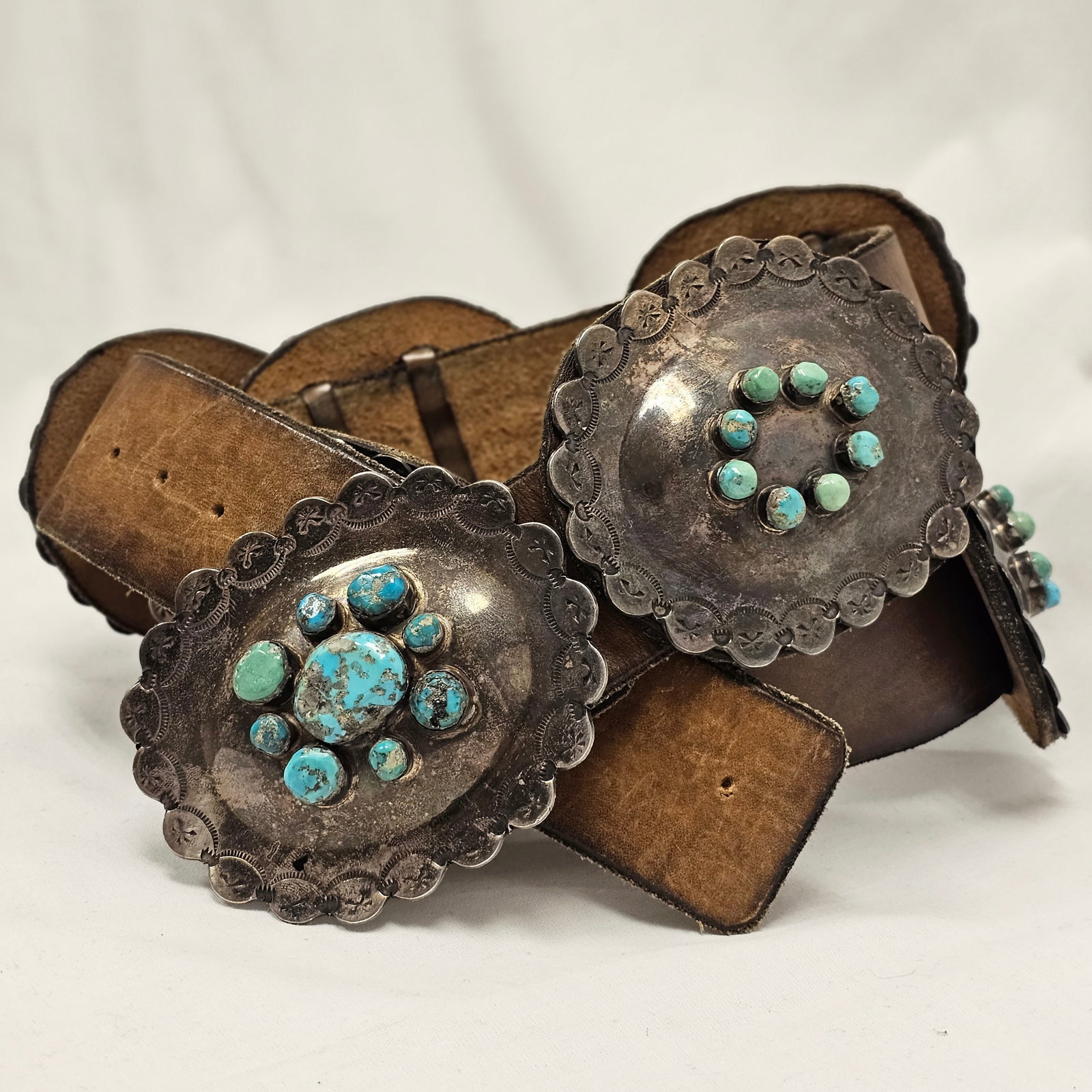 Sterling and Turquoise Concho Belt by Jobeth D. Mayes: Sterling and turquoise concho belt, signed on buckle Jobeth D. Mayes Zuni. Missing one stone