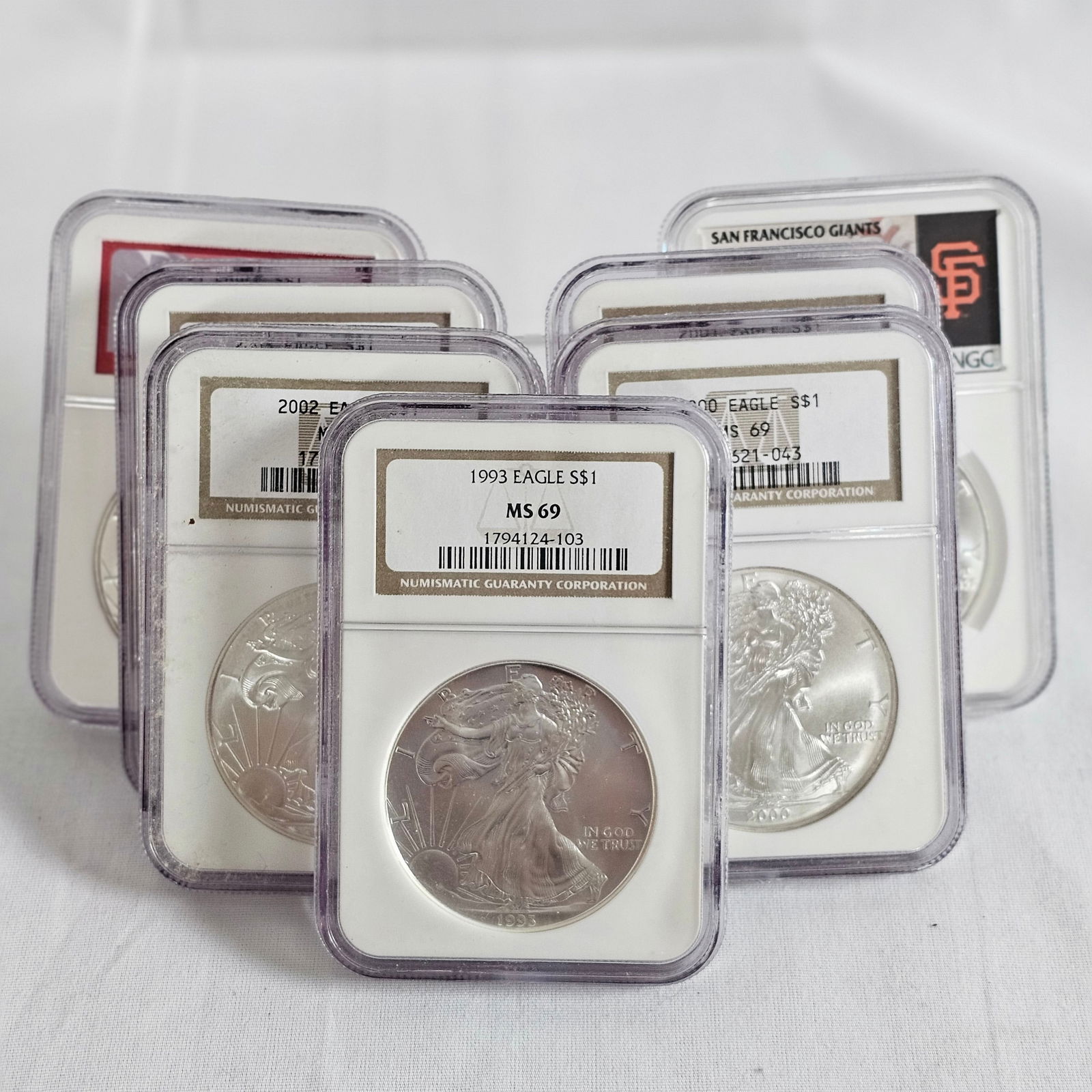 Group of Seven NGC MS 69 Graded American Eagle Silver Dollars (1 of 14)