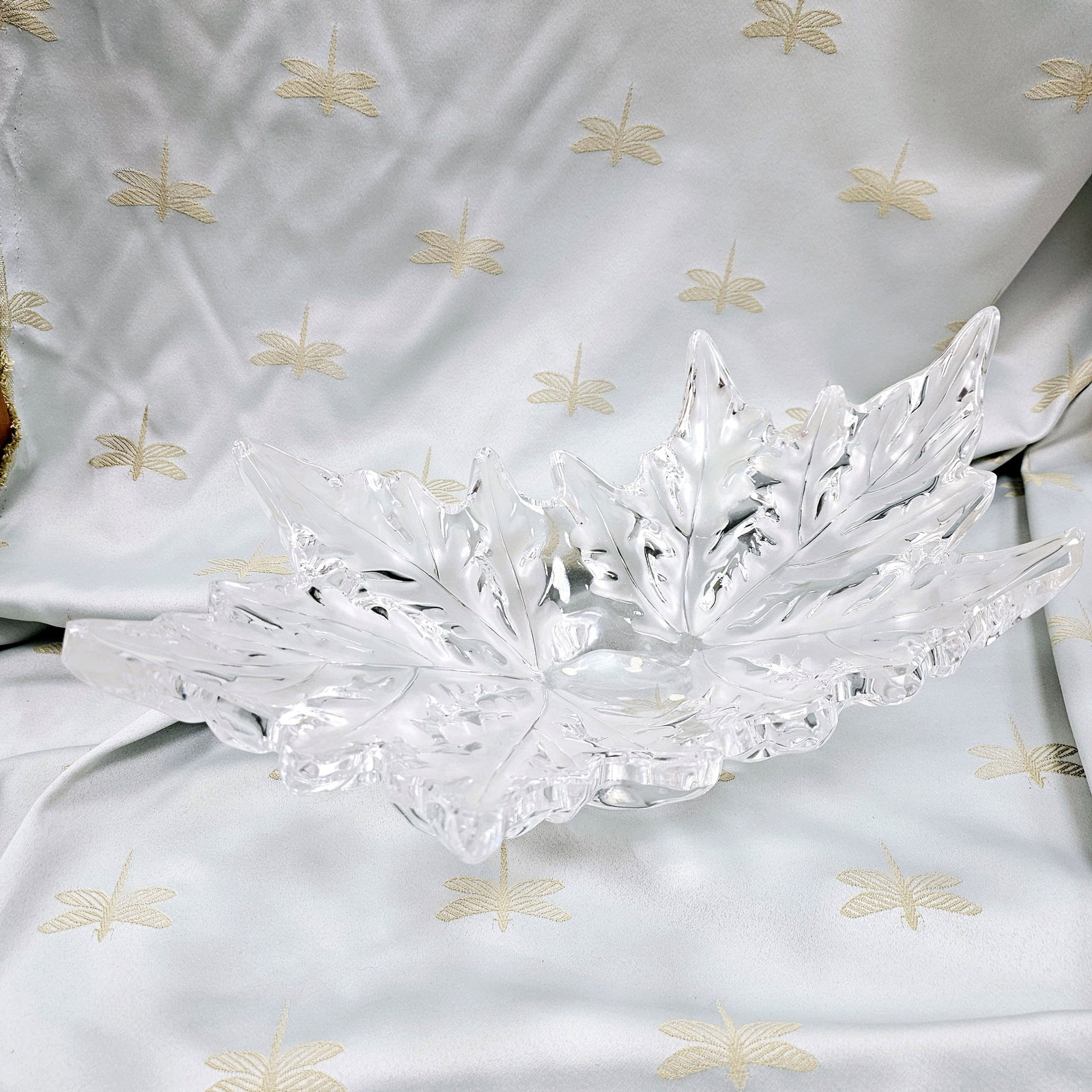 Lalique France 'Champs Elysee' Center Bowl: Lalique France 'Champs Elysee' center bowl composed of clear and frosted glass in an oak leaf motif. Signed on bottom Lalique France. Measurements: approximately 17 1/2 in L x 9 1/2 in W x 7 1