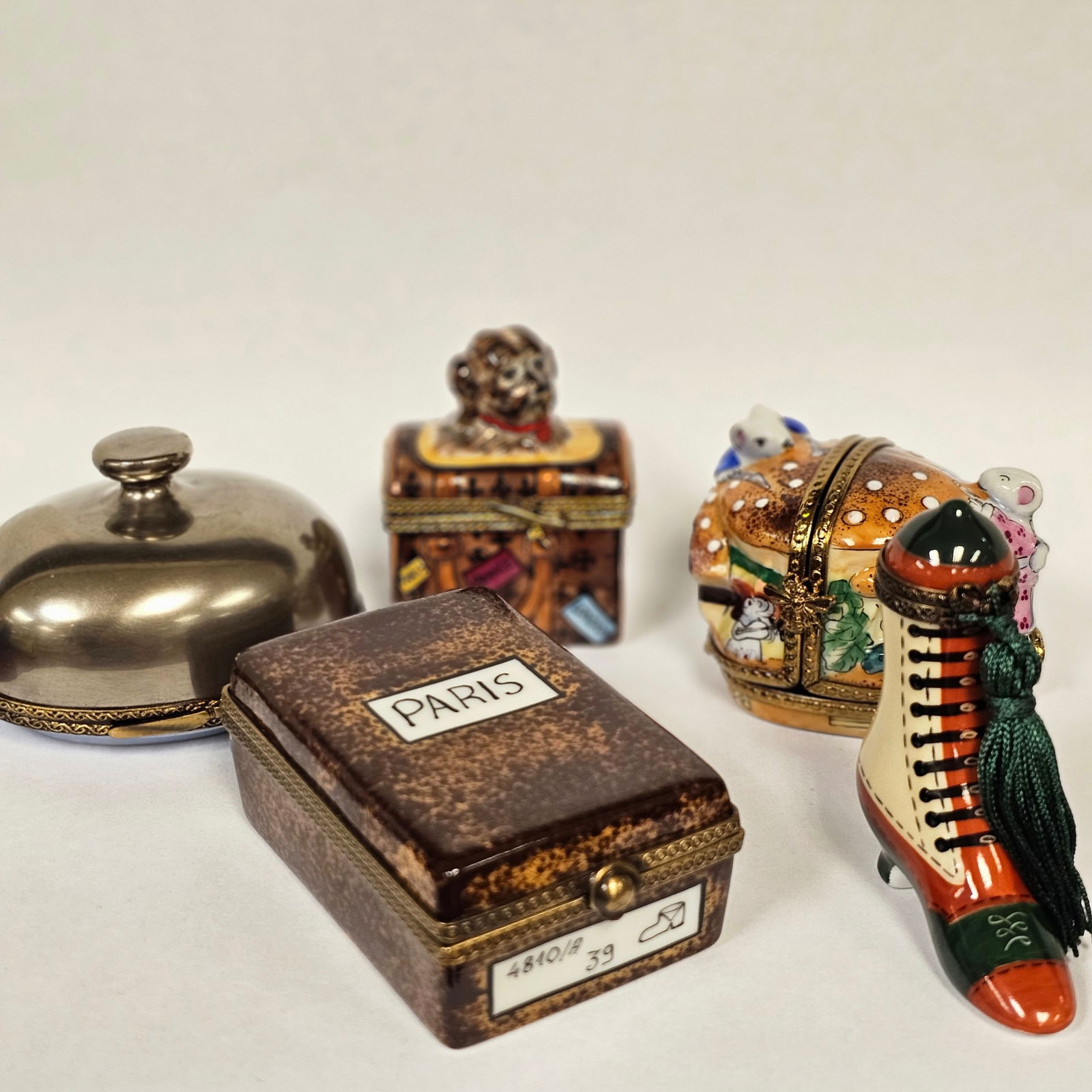 Group of Five Limoges includes Mice on Hamburger House: Heeled boot with tassel, Paris Shoe box, dog in purse, and turkey inside of lidded dish.