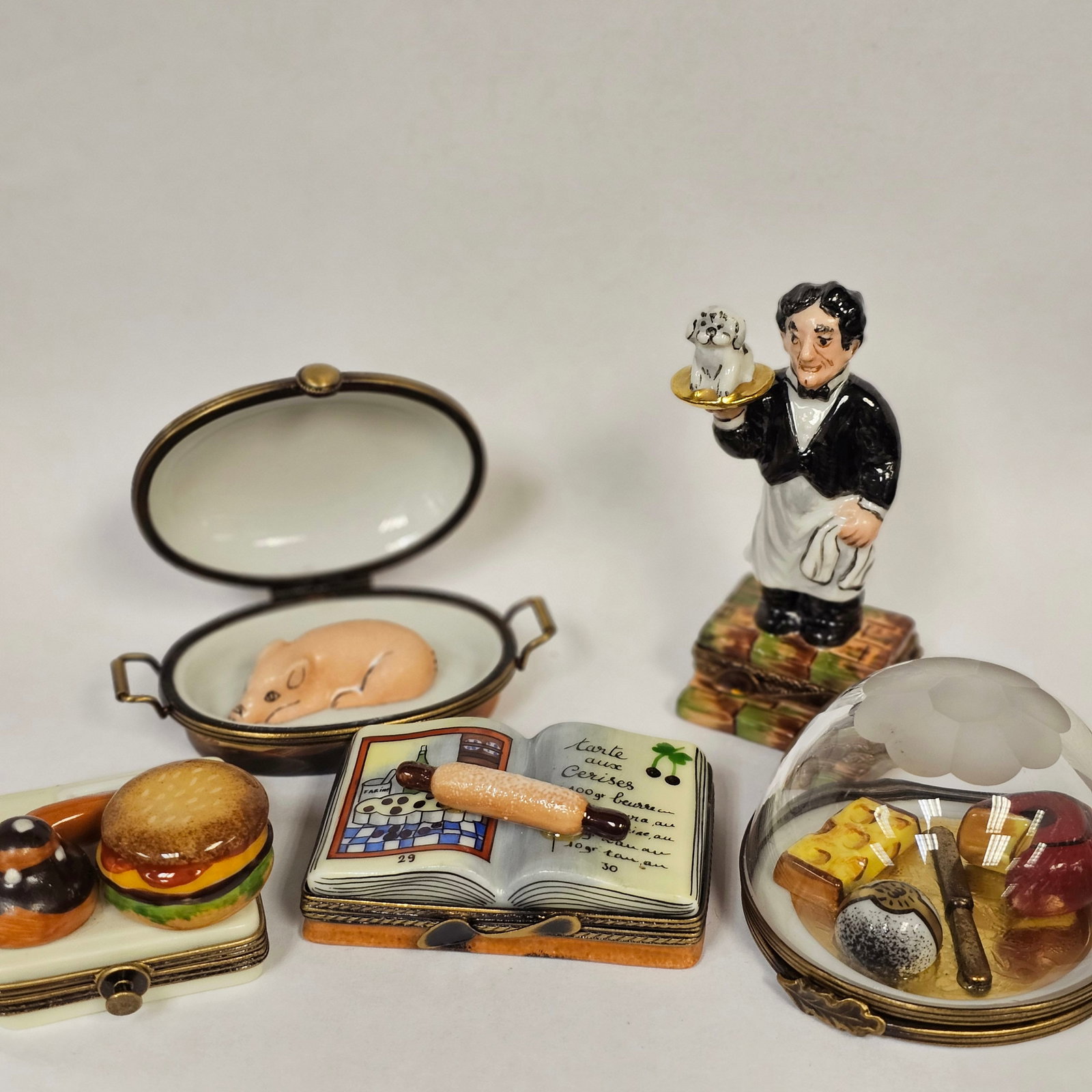 Group of Limoges with Waiter: Waiter and other misc food items, recipe book, and domed glass cloche food tray. 