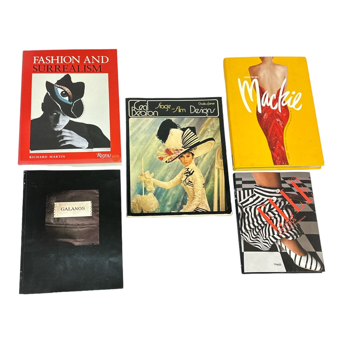 Art Fashion Books: A grouping of five fashion books: Galanos Lookbook/Catalog, Cecil Beaton Stage and Film Designs, Fashion and Surrealism, and an Elle Style - The 1980s. Largest measures: 12" x 9.5