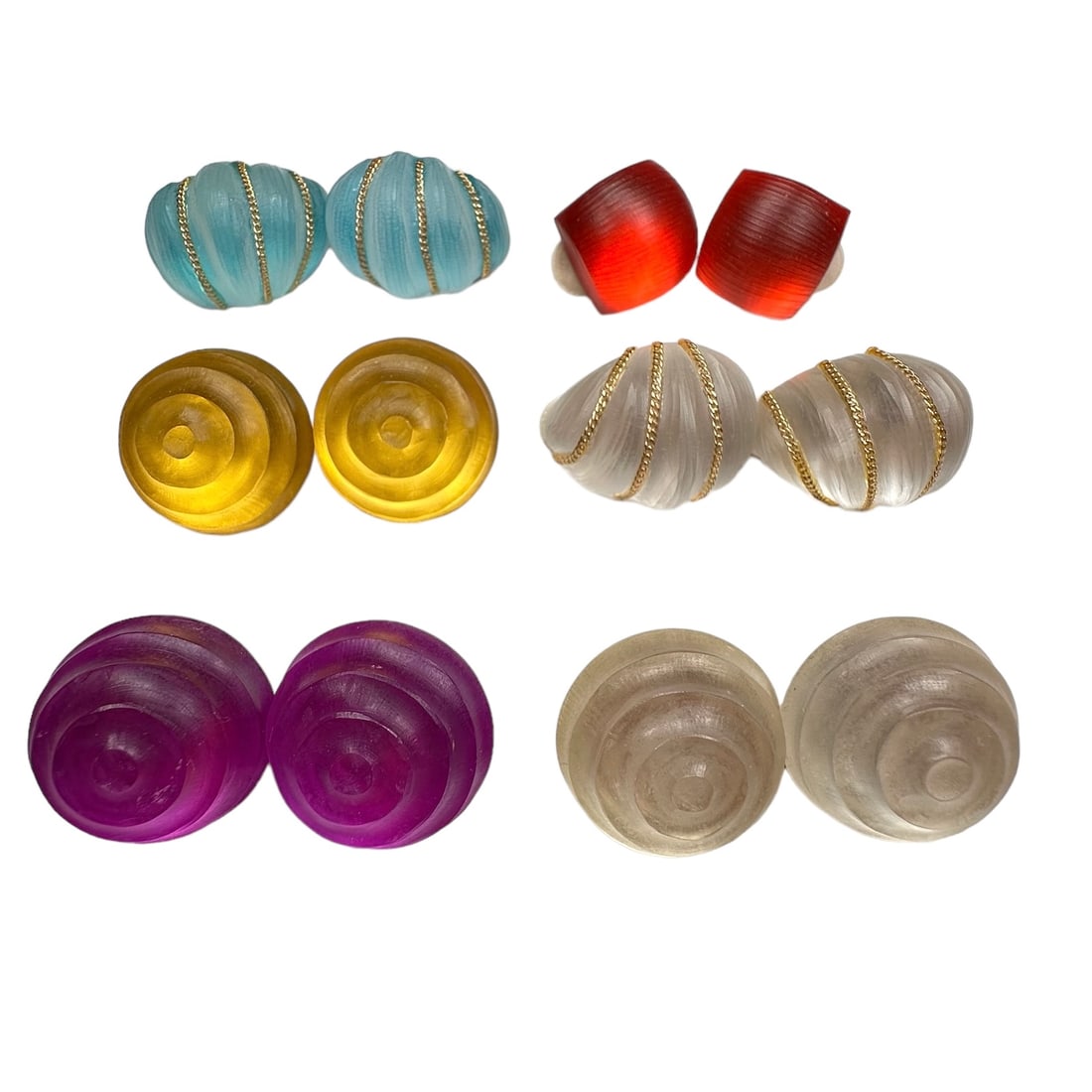 Group of Alexis Bittar Lucite, Gold-Tone Ear Clips: Comprising six pairs of Lucite, gold-tone ear clips in various colors and shapes, all signed Alexis Bittar. Gross weight: 75.9 grams. From the Estate of Fritz and Lucy Jewett.