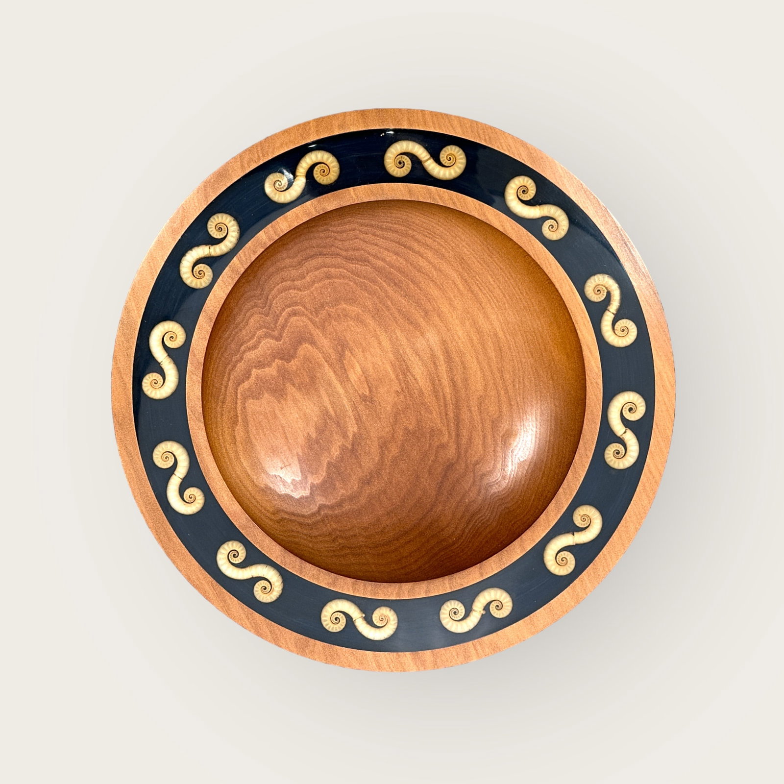 New Zealand Kauri Bowl with Shell Inlay: Signed, and mentions Ancient Kauri. Inlay with shell design. Measures about 10.25". Condition is very good. From the Estate of Fritz and Lucy Jewett.