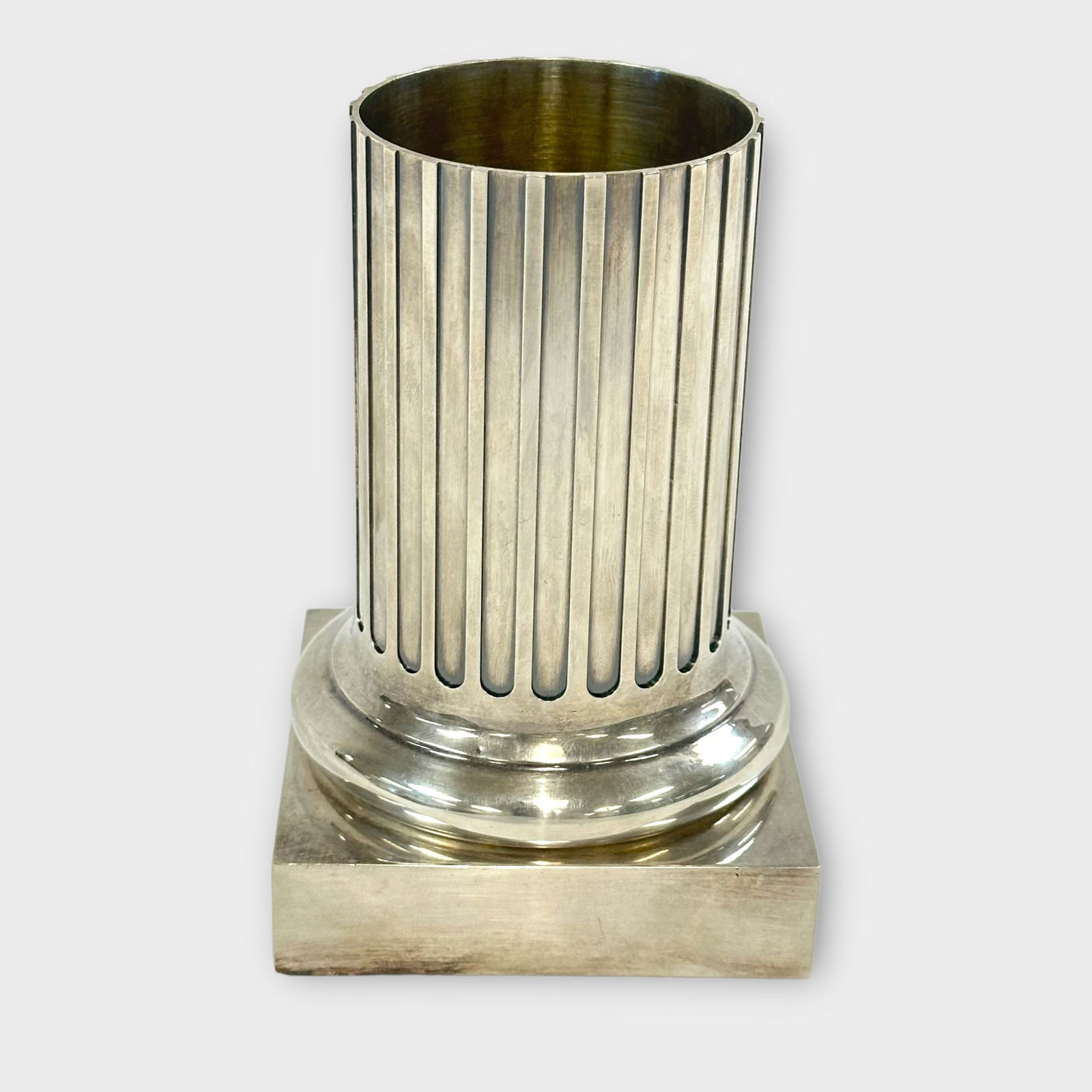 Bvlgari Sterling Silver Pillar Vase: A Bvlgari sterling silver pillar vase, marked on bottom "Bvlgari .925 BD4427". Gross weight approximately 453.1 grams. Measures approximately 4 3/4 in T x 3 1/2 in W (square base) Condition