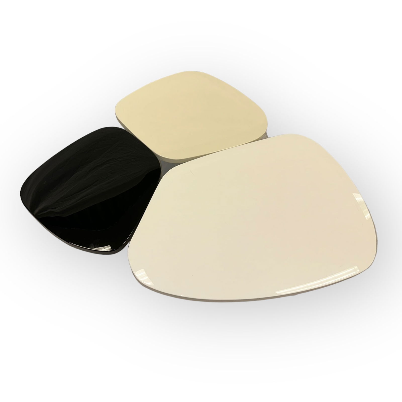 India Mahdavi (B. 1962) "Flower" Lacquer Coffee Table: India Mahdavi (B. 1962) "Flower" lacquer coffee table, made in France. India Mahdavi medallion affixed to the bottom of the table. Largest petal is in white with the other two petals in sand