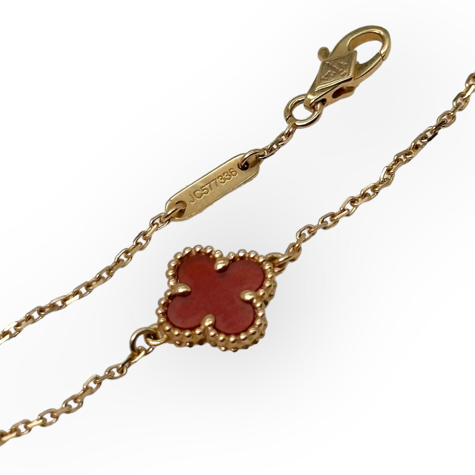 Carnelian, 18k Rose Gold "Sweet Alhambra" Bracelet, Van Cleef & Arpels: Featuring a carnelian agate station joined to 18k rose gold cable links, completed by a lobster claw clasp forming a bracelet, adjustable at 6 1/4 and 7 inches. Gross weight: 1.8 grams. Marked "V