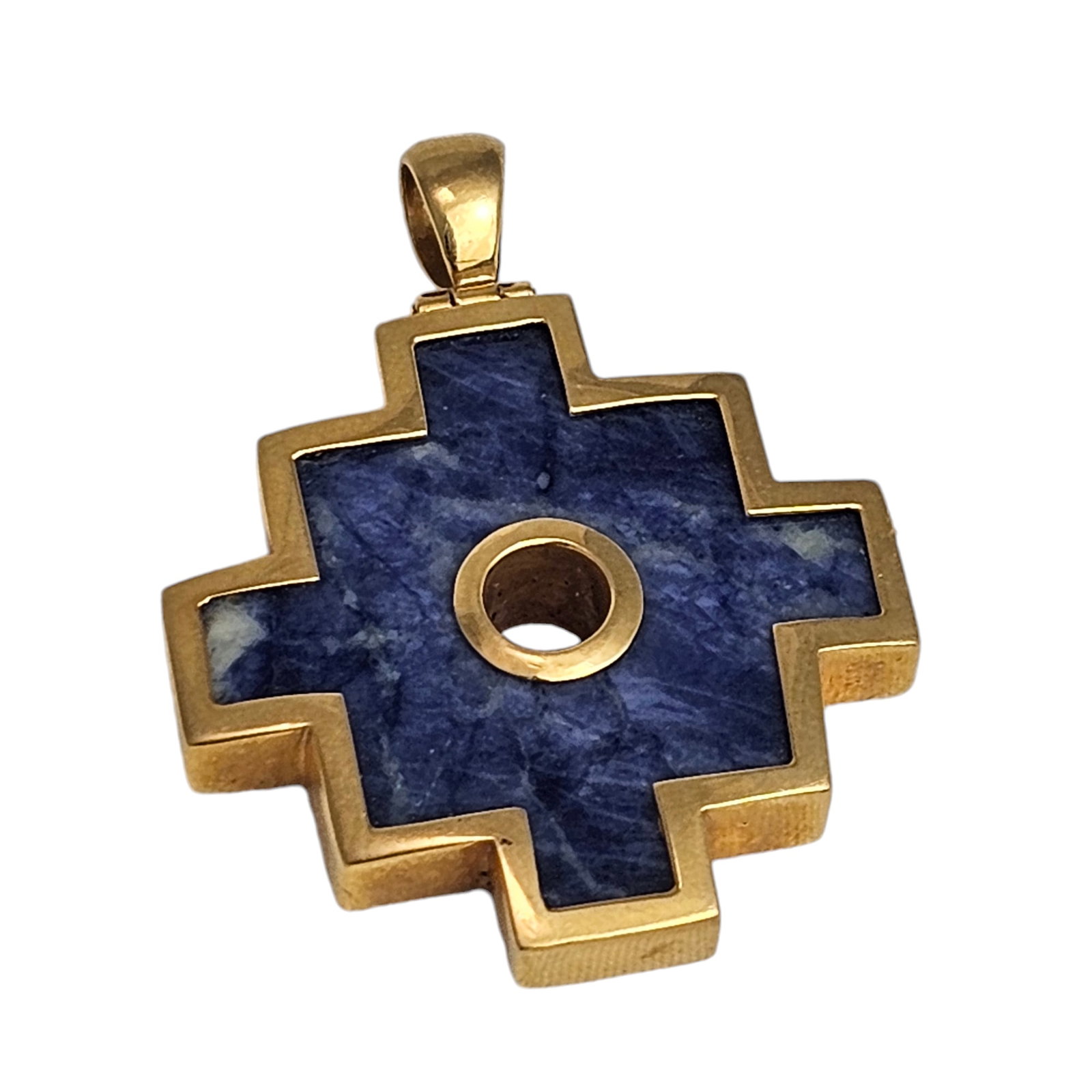 Sodalite, 18k Yellow Gold Pendant: Designed as a stylized cross, featuring sodalite set in an 18k yellow gold pendant mounting measuring approximately 1.82 x 1.39 inches. Gross weight: 14.4 grams. Absence of a condition report does not