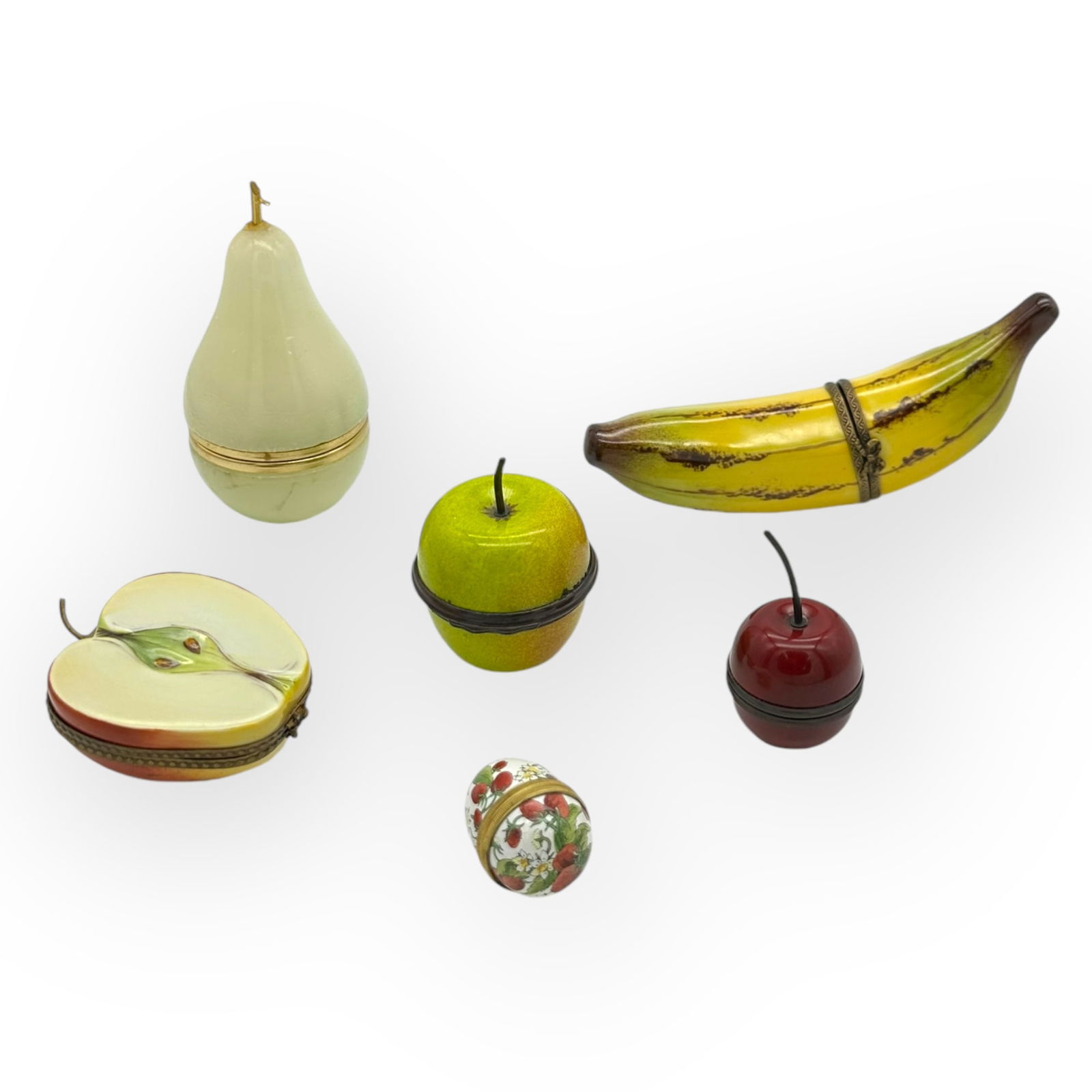 Group of 6 Limoges Porcelain and Enamel Lidded Boxes: Group of 6 Limoges porcelain and enamel lidded boxes, consisting of a banana and apple, both with hinged opening and marked to the inside "Limoges France Peint Main P.V.", largest: 5 in ; 3