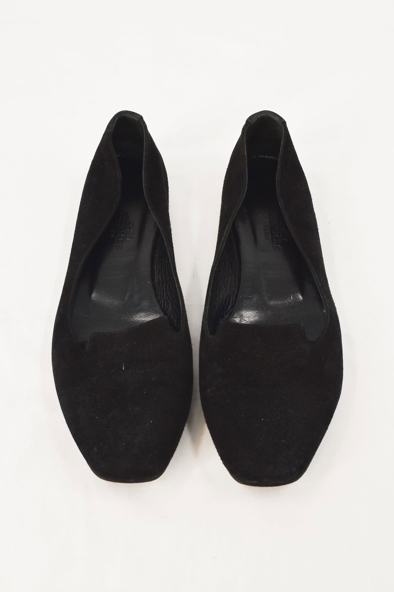 Black Hermes Suede Loafers: A pair of Hermes black suede loafers, size 37. Absence of a condition report does not mean the item is in perfect condition. Condition reports provided may not list all condition issues on the item or