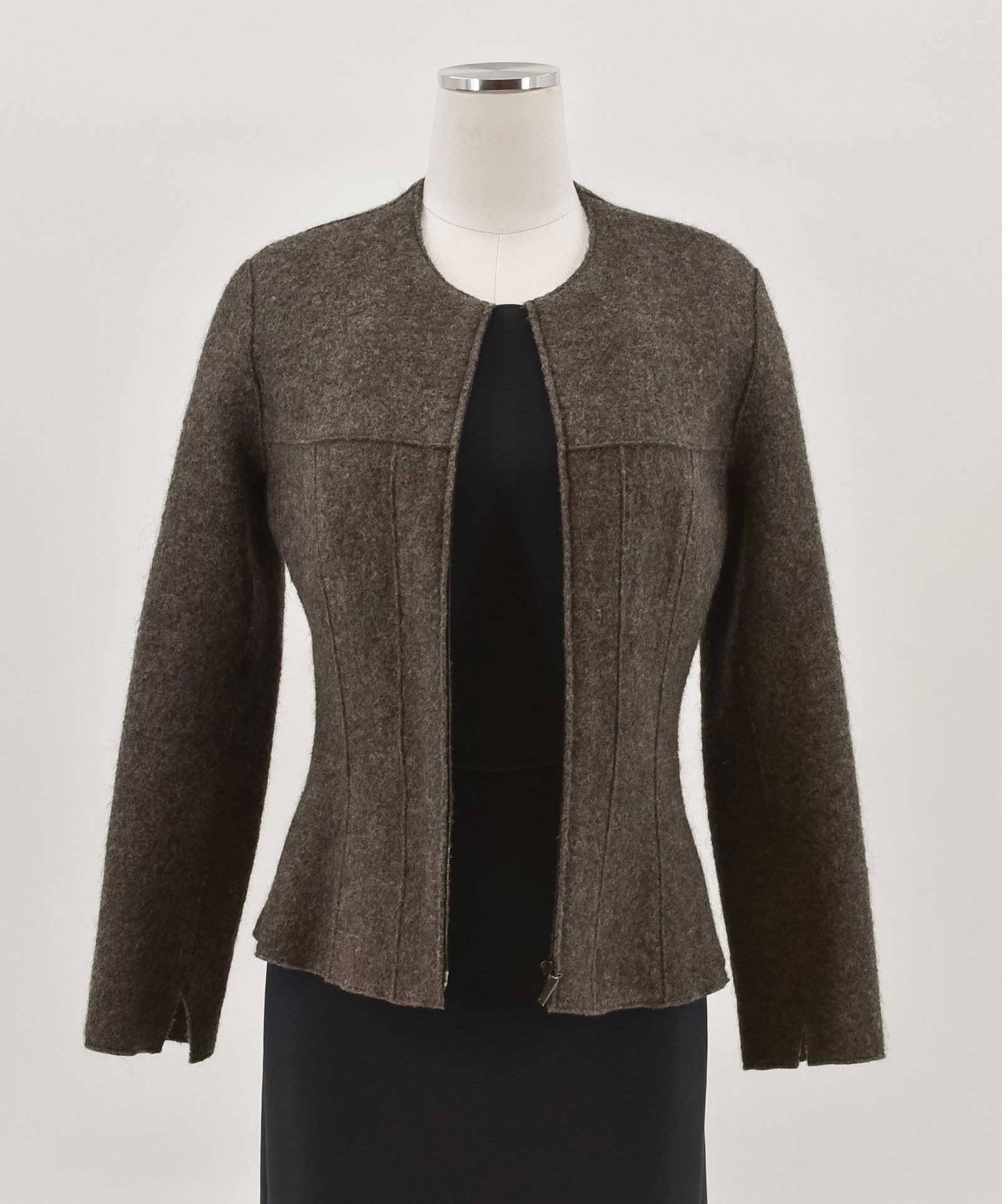 Prada Wool Ladies Zip Front Jacket: Ladies' dark gray wool Prada jacket with zip front, two front pockets, two interior pockets, silk lining, size Medium. Absence of a condition report does not mean the item is in perfect condition.