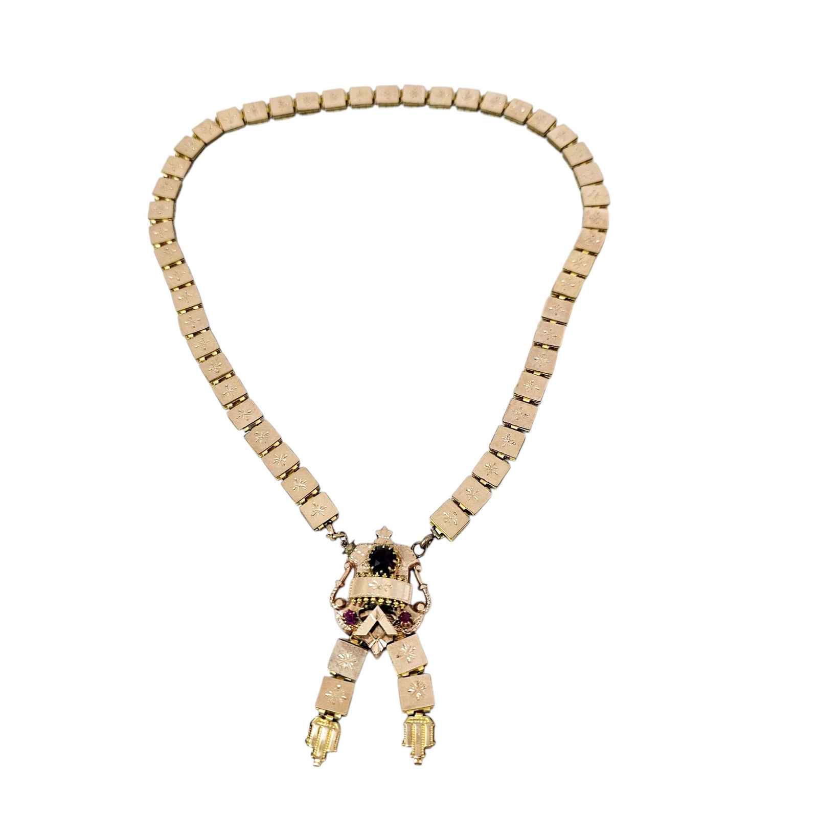 Victorian Glass, Gold-Filled Necklace: Yellow reversing to rose gold-filled book chain links joined to an amphora-shaped clasp highlighted by three round red glass stones, completed by two book chain drops forming a 22 inch necklace (total