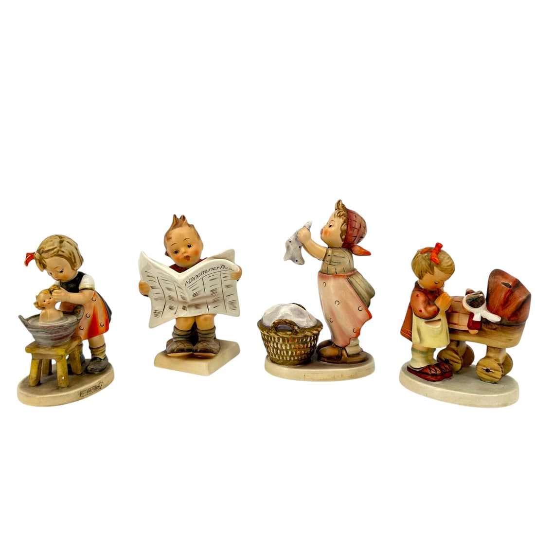 Group of 4 Hummel Figurines (1957-1972): Group of 4 Hummel figurines from 1957-1972, including a little boy reading the newspaper, a little girl with her doll and stroller, a little girl with her laundry basket and a little girl giving her d