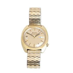 Gent's Bulova "Accuquartz," 14k Yellow Gold, Stainless Steel Wristwatch