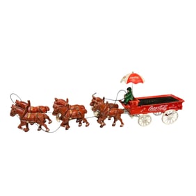 Grouping of Coca-Cola Cast Iron Toys