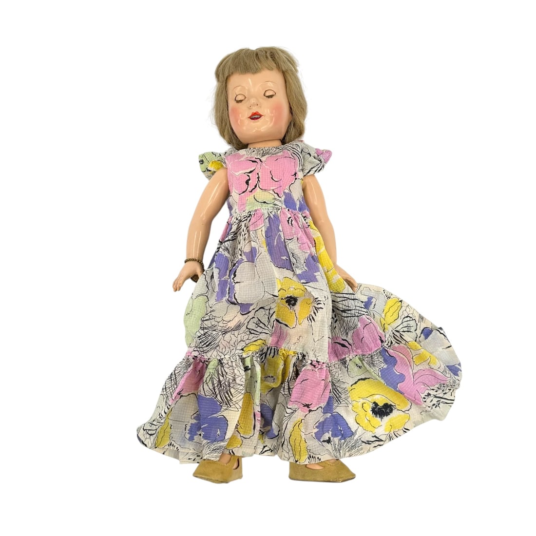 Effanbee Composition Anne Shirley doll: doll with brown sleep eyes, open mouth and five-piece body. Doll retains her original heart bracelet Absence of a condition report does not indicate that this lot is in perfect condition. Please