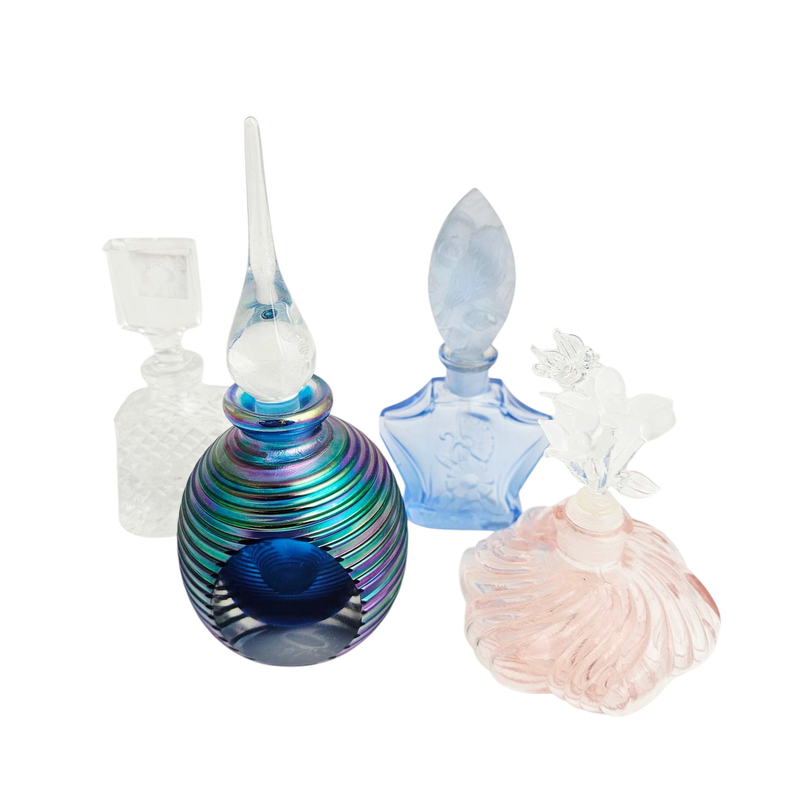 (Lot of 4) 20th Century Glass Perfume Bottles: (Lot of 4) 20th Century Glass Perfume Bottles, consisting of a contemporary iridescent globular example, a pink glass bottle with floral form stopper, clear brilliant molded example and a blue gl