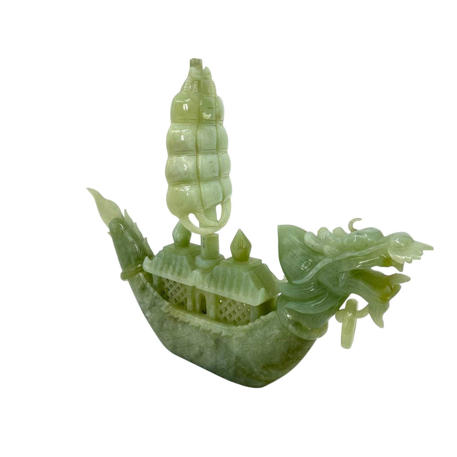 Contemporary Chinese Carved Greenstone Dragon Form Junk Ship: Contemporary Chinese Greenstone carved dragon form Junk sailing ship model. Having two pierced cabins, below a billowing sail incised with Chinese characters, the bow as an open-mouthed dragon&nb
