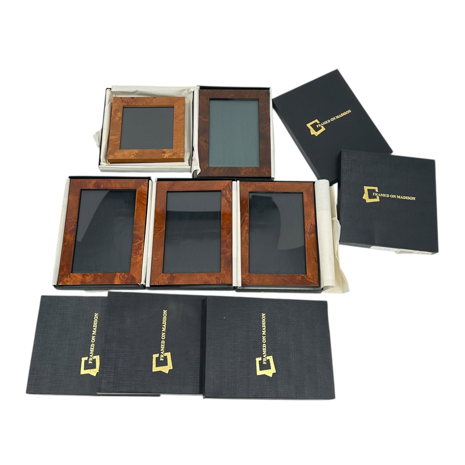 (Lot of 5) Framed on Madison Walnut Frames in Boxes: Wood frames in boxes, mostly 6x4 and one 4x4. Absence of a condition report does not indicate that this lot is in perfect condition. Please request a condition report as needed, prior to bidding