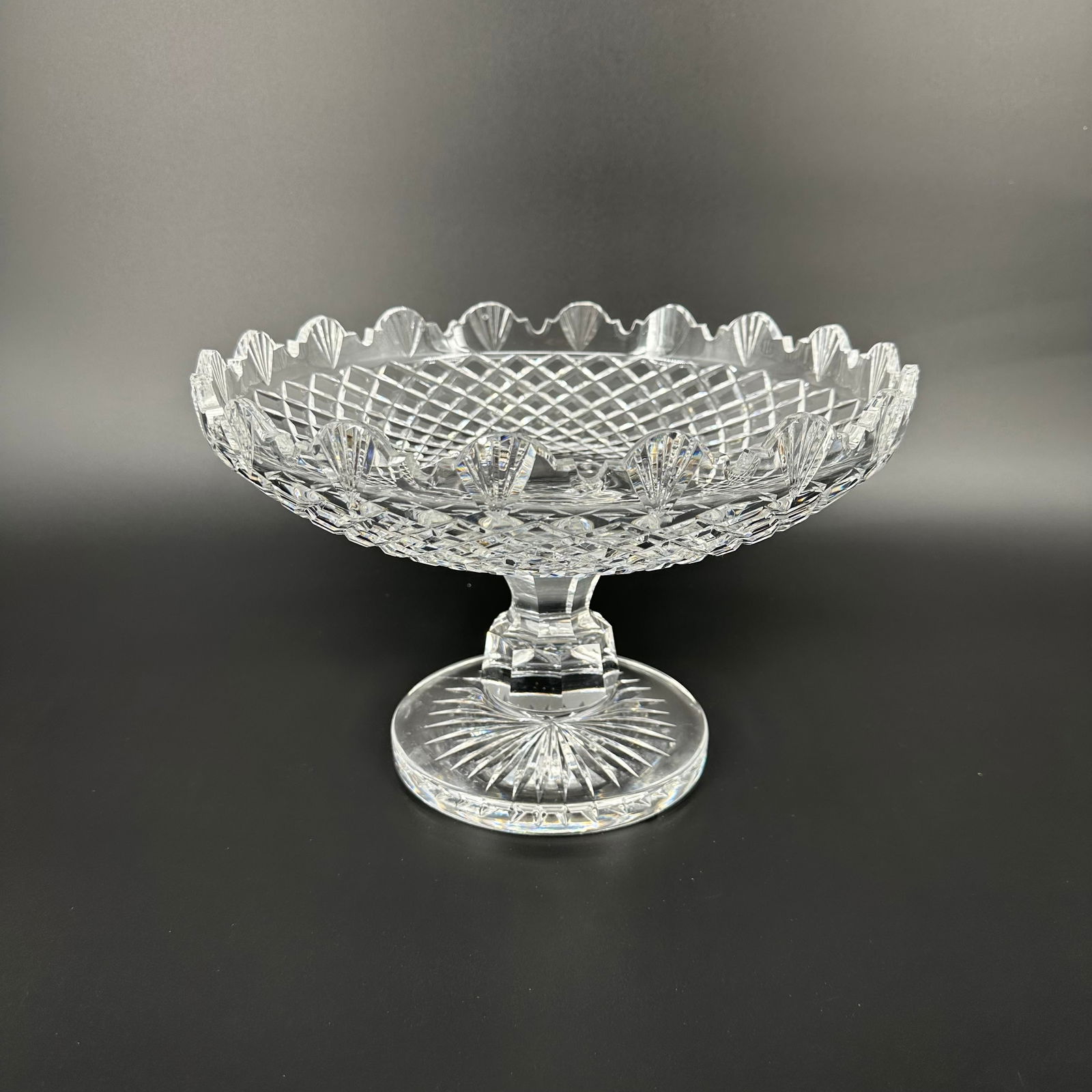 Waterford Master Cutter Centerpiece Footed Bowl: Waterford Master Cutter centerpiece footed bowl, measuring approximately 8 in H x 12 in D. Signed at base. Condition is good, with no signs of damage.