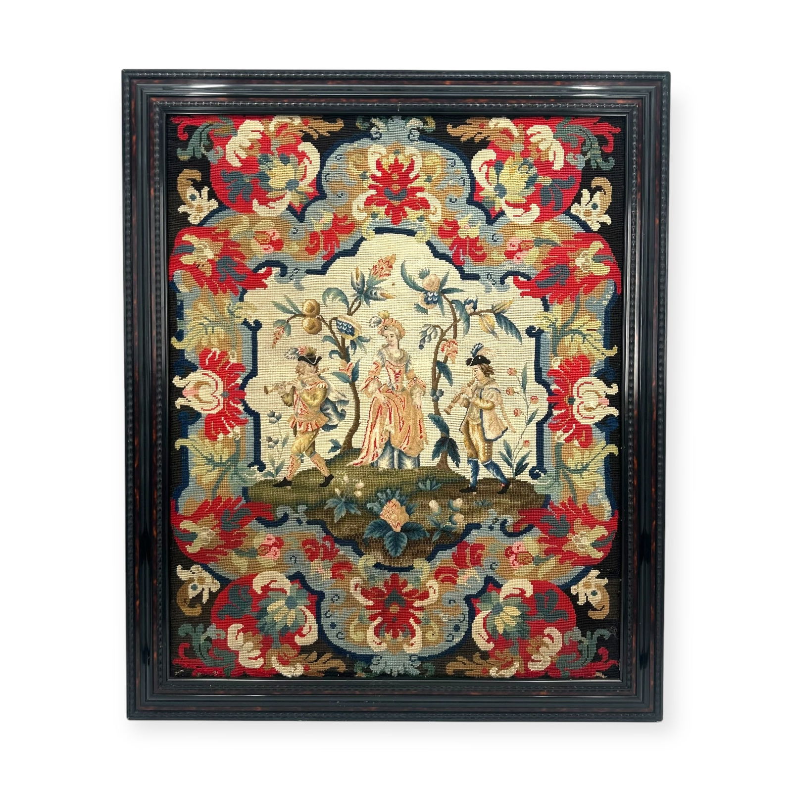 Early 19th Century Framed Continental School Tapestry: Continental School Early 19th Century, French or Northern Italian needlepoint tapestry panel, likely originally as part of a fire screen, depicting a verdant garden with a finely dressed lady flanked