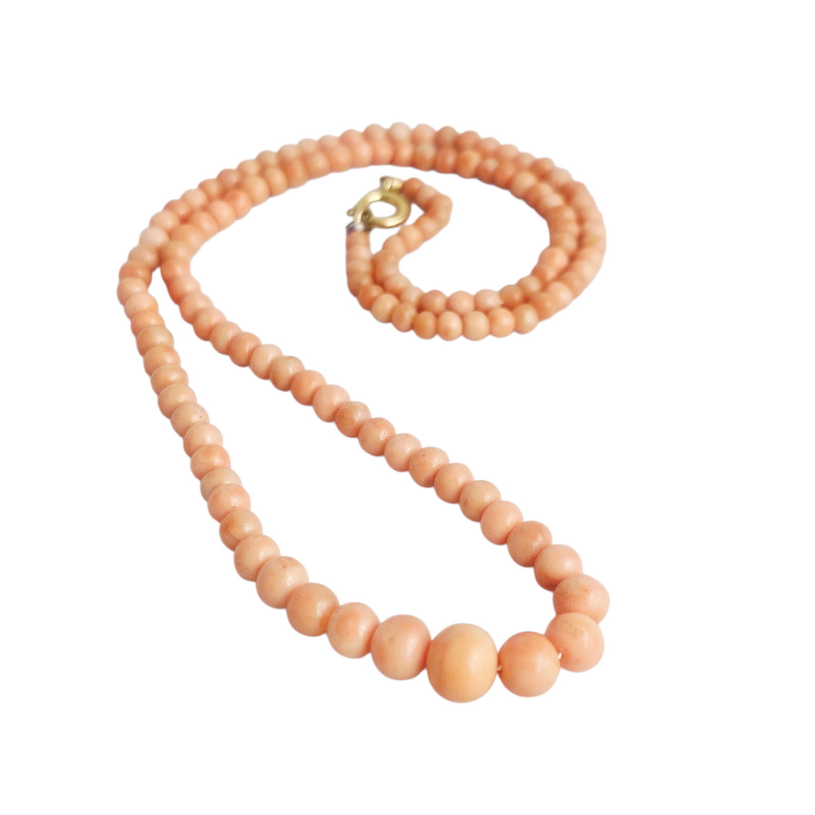 Graduated Coral Necklace: Composed of one hundred twenty-nine near round coral beads measuring from approximately 8.0 to 3.0 mm, completed by a gold-filled spring ring clasp forming a 19 inch necklace. Gross weight: 15.1 grams